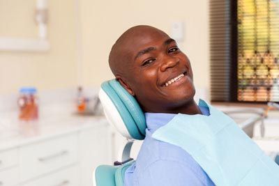 man smiling during his cosmetic dentistry procedure