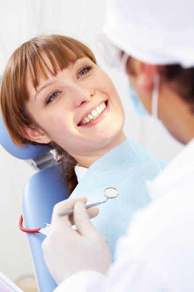 woman smiling at Precious Smiles Family Dentistry