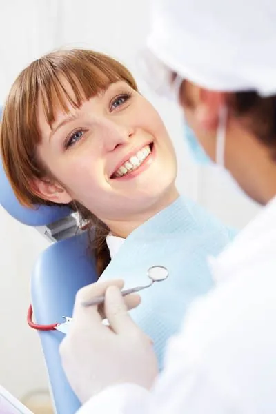 woman smiling at Precious Smiles Family Dentistry