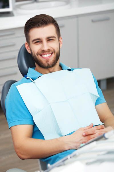 man getting a root canal in Tampa, FL